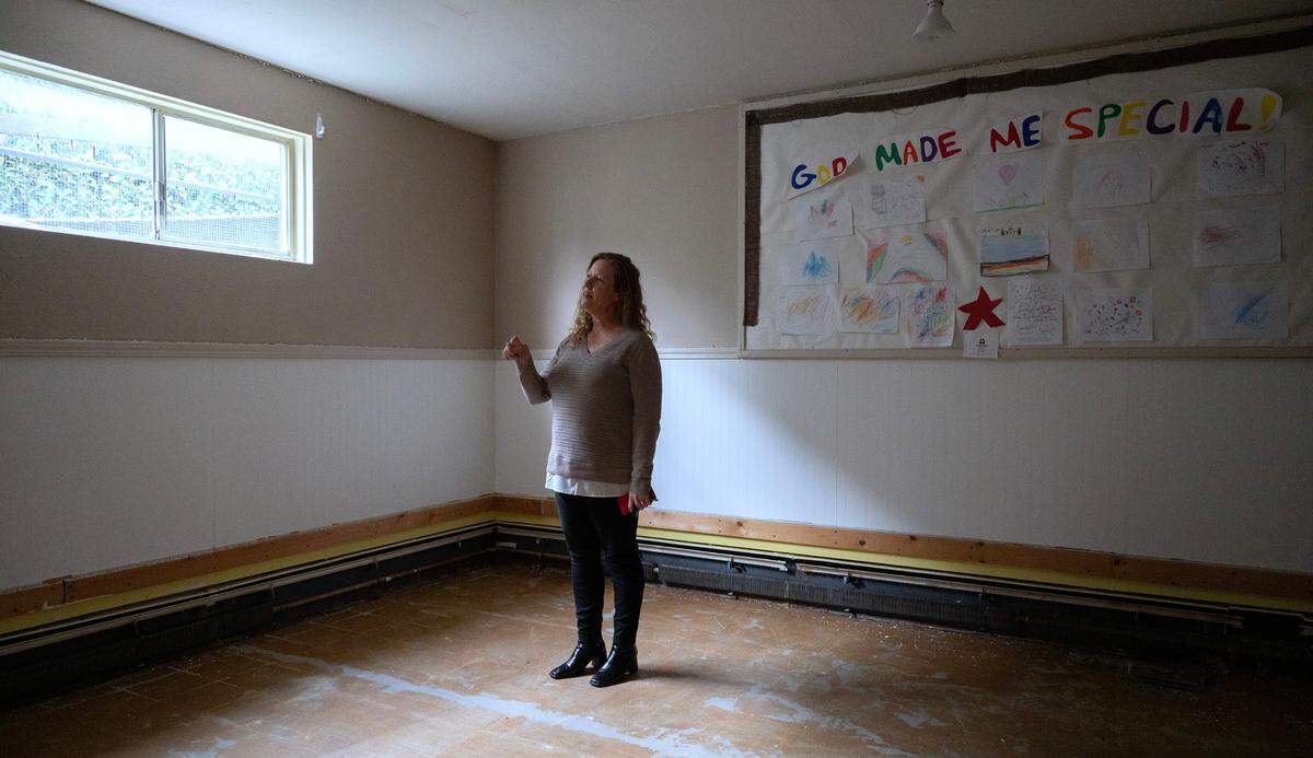 Julie Cain of Warner Street Amici House LLC gives a tour of the former Peace Assembly Church in Tacoma, Washington, on Thursday, Feb. 1, 2024. Amici House plans to transform the building into affordable young-adult community housing.