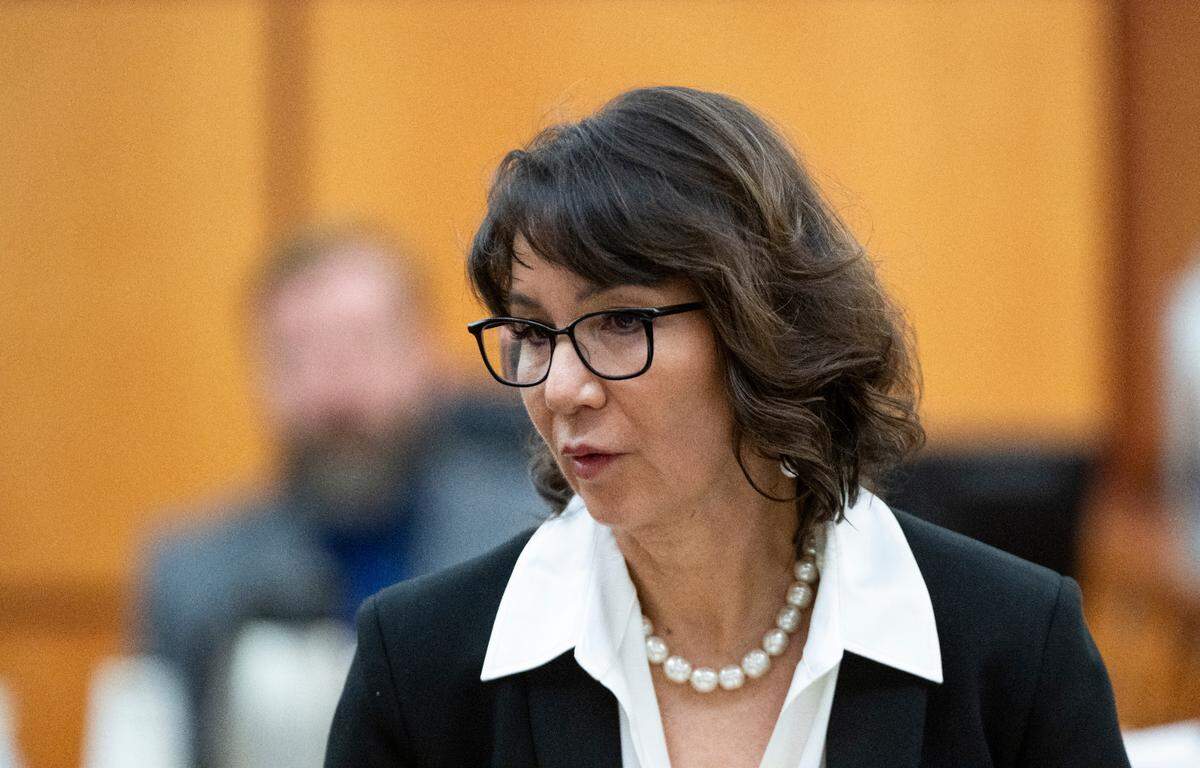Special prosecutor Patty Eakes walks off Tuesday after finishing cross-examination of defendant Matthew Collins during the trial of three Tacoma police officers in the killing of Manny Ellis.