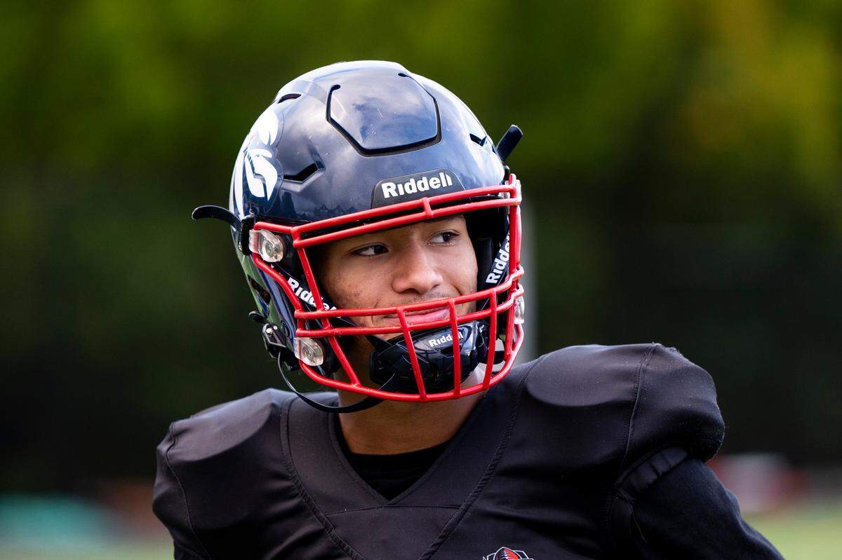 Life Christian Academy quarterback Jabez Boyd smiles during a practice at Life Christian Academy, Wednesday, Oct. 11, 2023, in Tacoma, Wash.