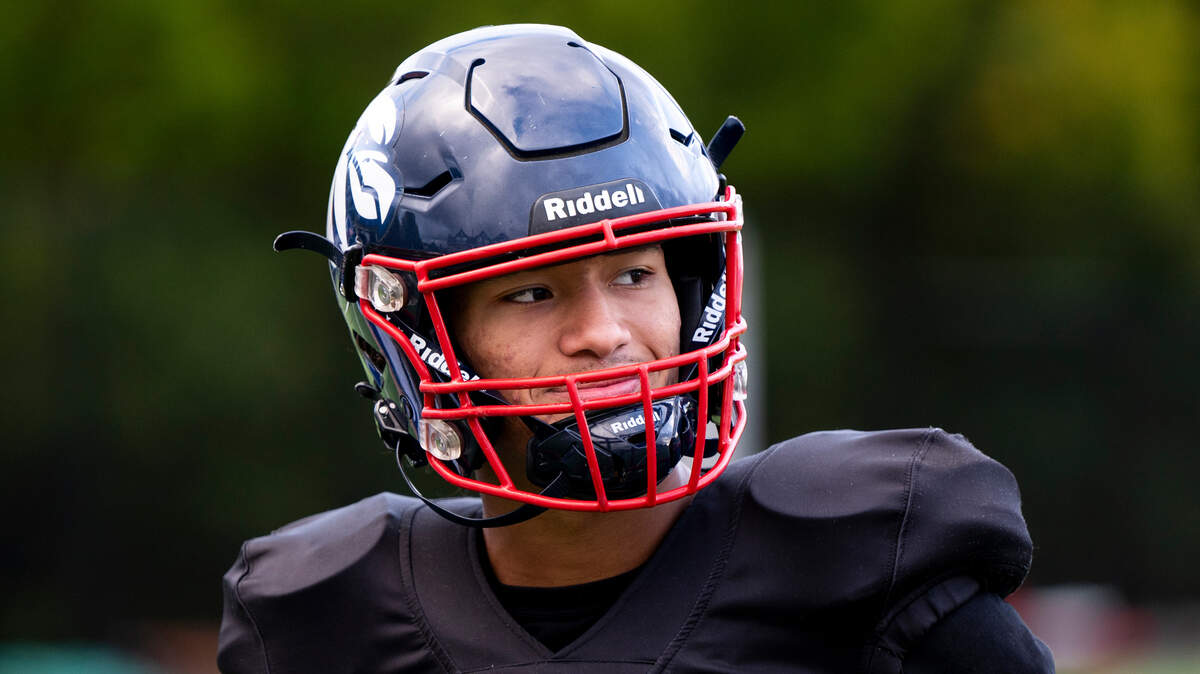 Life Christian Academy quarterback Jabez Boyd smiles during a practice at Life Christian Academy, Wednesday, Oct. 11, 2023, in Tacoma, Wash.