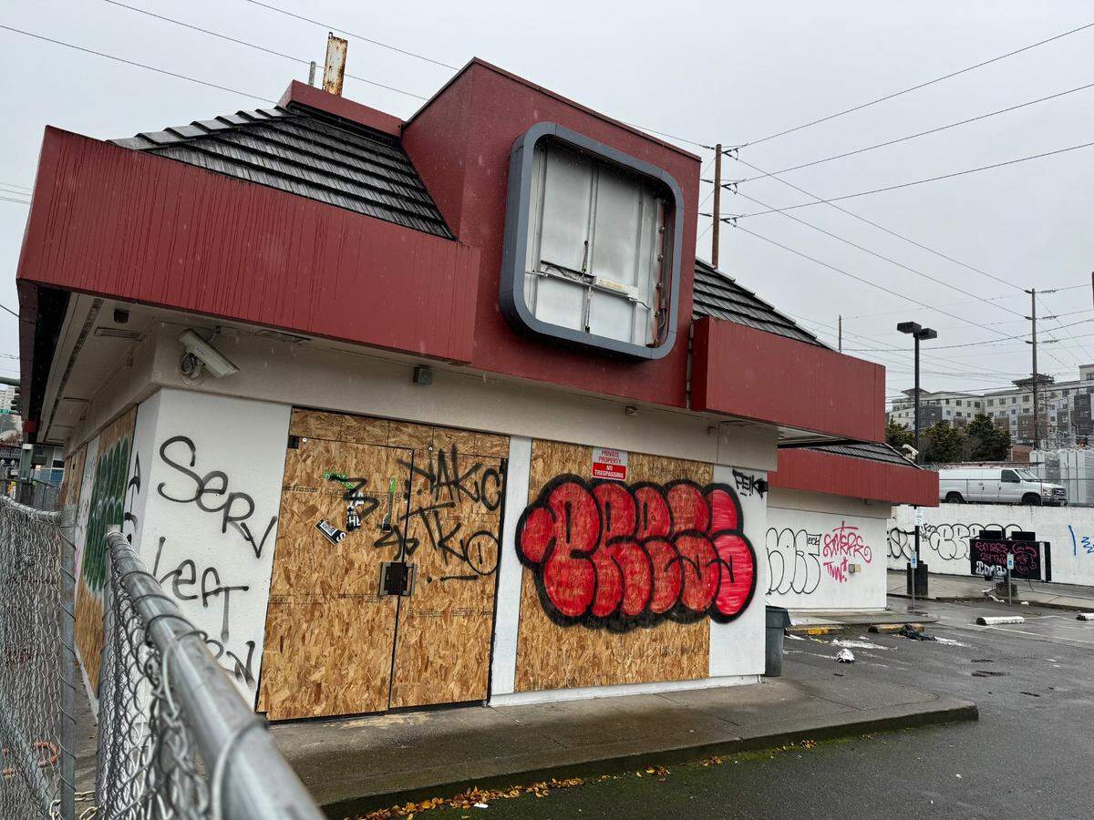 Graffiti covers the exterior of a closed Jack in the Box restaurant at 2422 Pacific Ave. in downtown Tacoma Nov. 14, 2024.