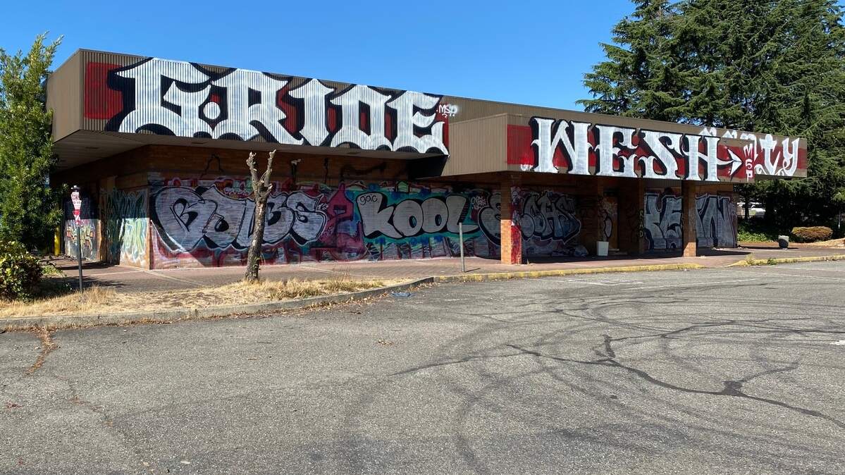 The former Amtrak station at 1001 Puyallup Ave. in Tacoma is surrounded with trash, fire scars and graffiti in early September 2023.
