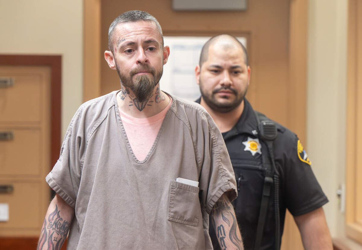 Ronald Thomas Stephens, 35, enters the courtroom for his arraignment at Pierce County Superior Court on Thursday, April 24, 2025, in Tacoma. Stephens has been charged with the fatal stabbing of his 65-year-old mother.