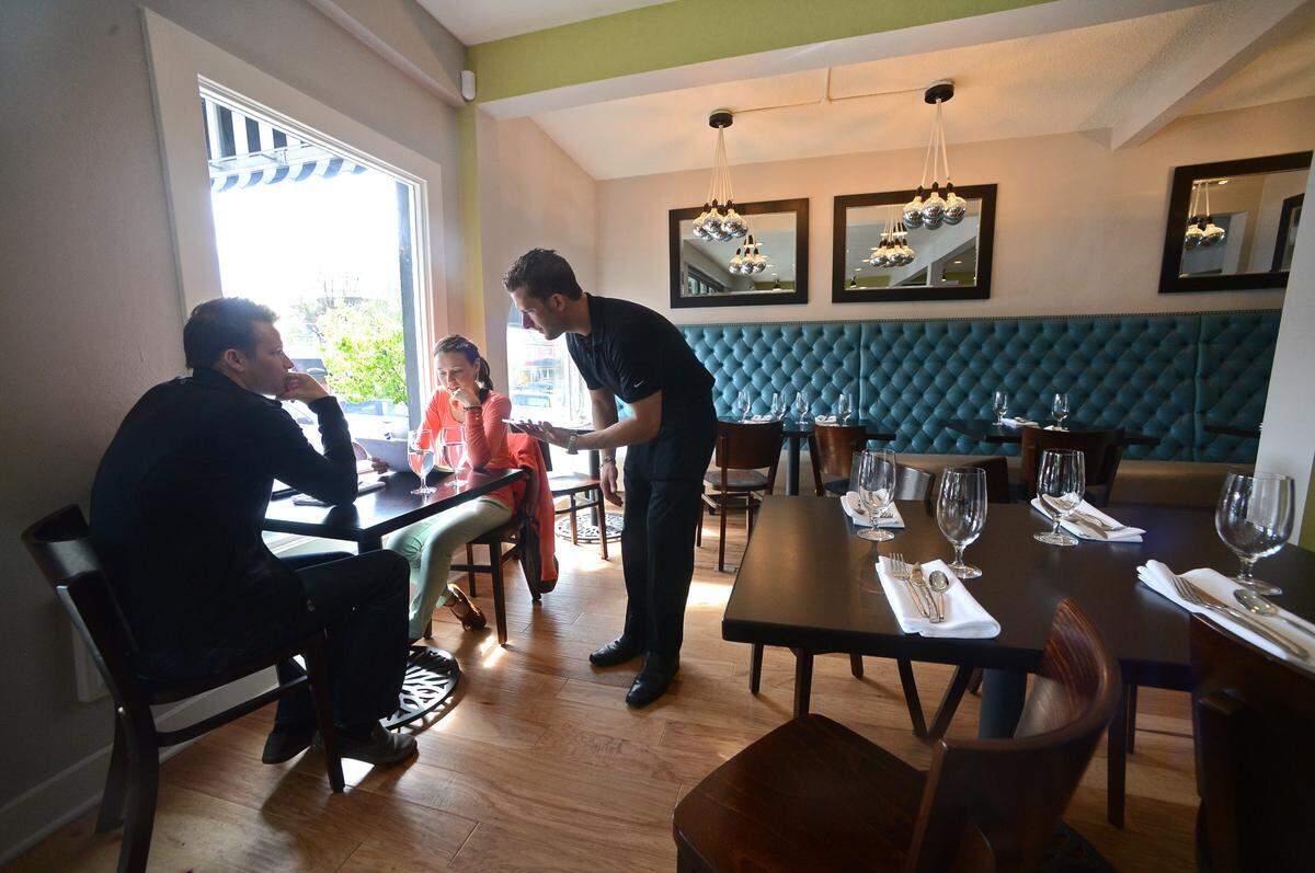 In this staff photo from 2013, diners await their meal at Art House Cafe not long after the restaurant opened.
