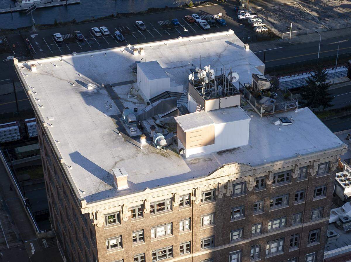 A collection of antennas are visible at the top of the Perkins Building on Wednesday, Feb. 19, 2026, in Tacoma, Wash. These are part of the Colocation Northwest's operation.