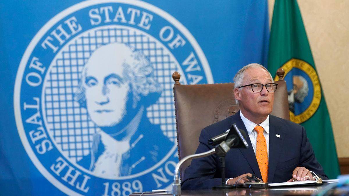 Washington Gov. Jay Inslee speaks Thursday, June 3, 2021, during a news conference in Olympia, Wash. Inslee announced that Washington will be the latest state to offer prizes to encourage people to get vaccinated against COVID-19. Incentives will include a series of giveaways during the month of June including lottery prizes totaling $2 million, college tuition assistance, airline tickets, and game systems. (AP Photo/Ted S. Warren)