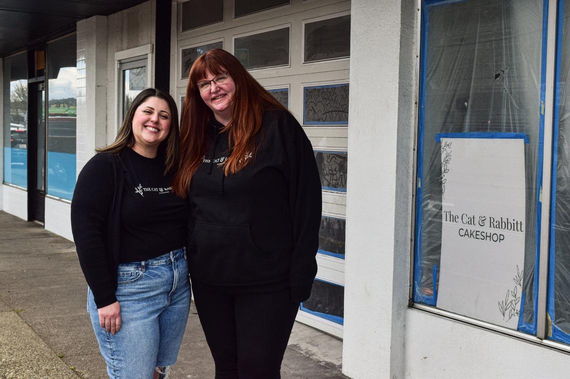 The Cat & Rabbitt owners Terryn Abbitt (left) and Julia Brown outside their Puyallup bakery before it opened in 2024. Their slice shop at Museum of Glass marks a return to the brand’s Tacoma roots.