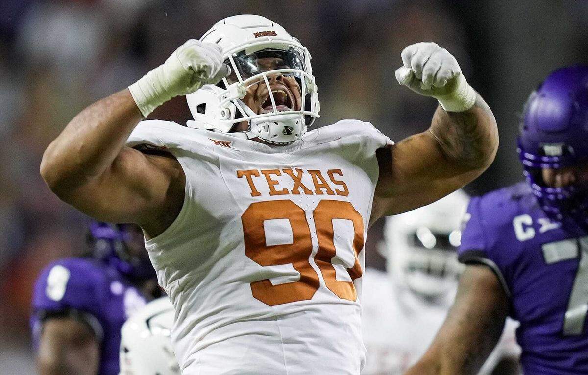 Texas defensive lineman Byron Murphy II celebrates after sacking TCU quarterback Josh Hoover last weekend. The Longhorns will need a strong effort by the defense down the stretch Saturday at Iowa State,