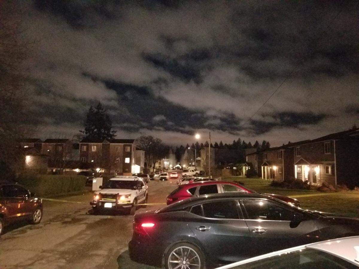 Tacoma Police Department officers on the scene of where a 29-year-old man may have been shot and killed Feb. 19 in South Tacoma. The man was identified Monday by the Pierce County Medical Examiner’s Office.