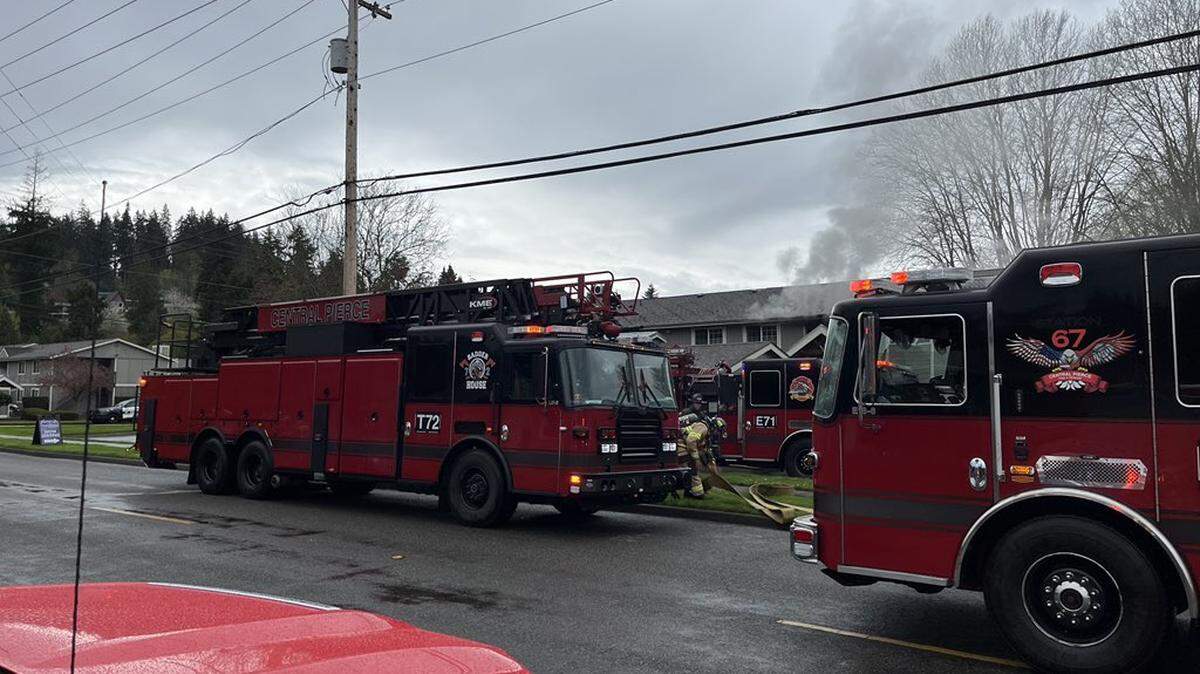 Several streets in Puyallup are blocked as Central Pierce Fire & Rescue crews clear up an apartment ifre on April 7, 2025.