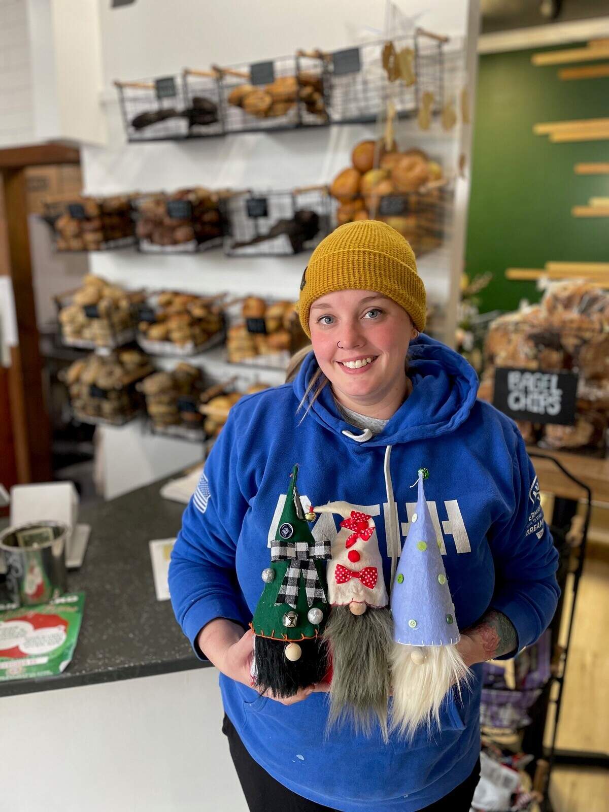 B’s Bagel and Butters pose with hidden gnomes.