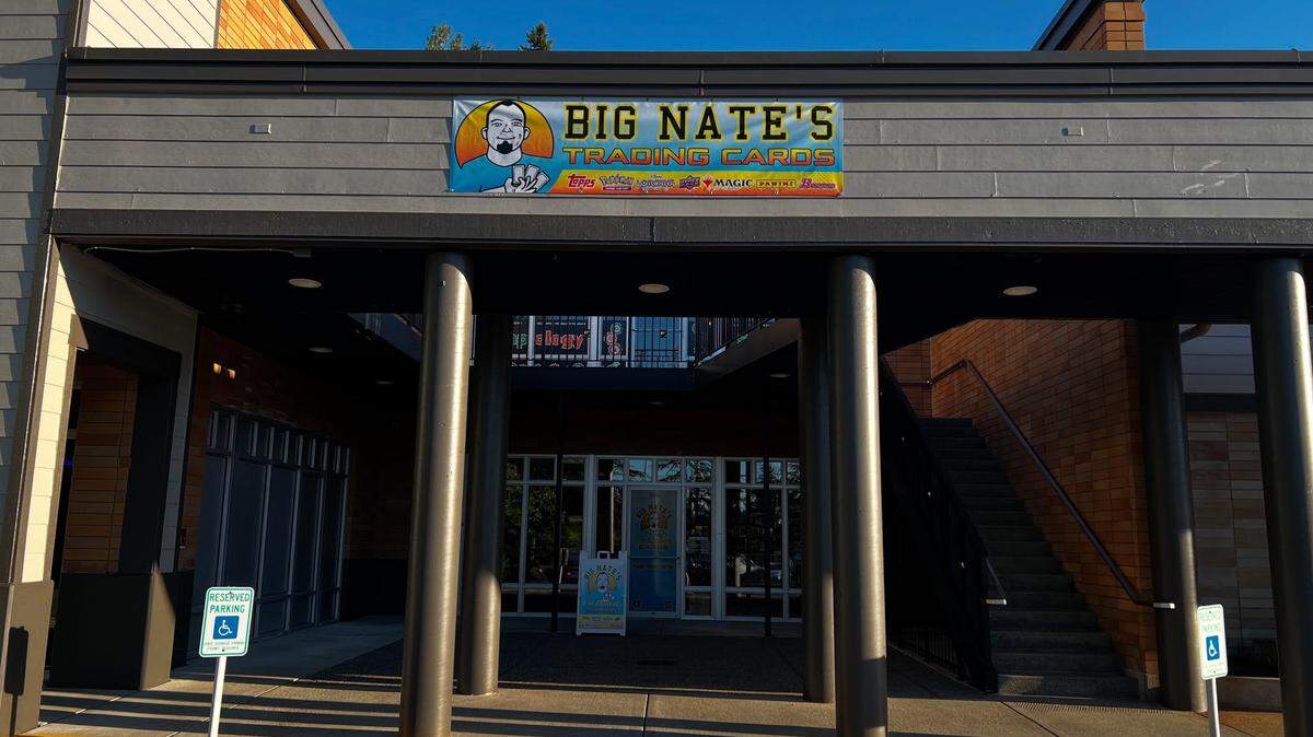 The storefront of Big Nate’s Trading Cards, a hobby shop selling baseball and other sports cards along with trading card games like Magic: The Gathering and Pokémon, at the Peninsula Shopping Center in Gig Harbor, Wash.