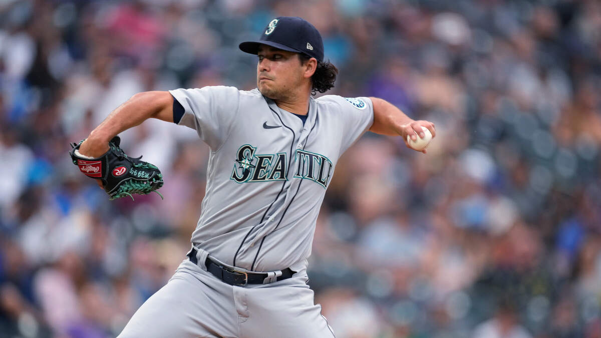 Seattle Mariners starting pitcher Marco Gonzales works against the Colorado Rockies during the first inning of a baseball game Tuesday, July 20, 2021, in Denver. (AP Photo/David Zalubowski)