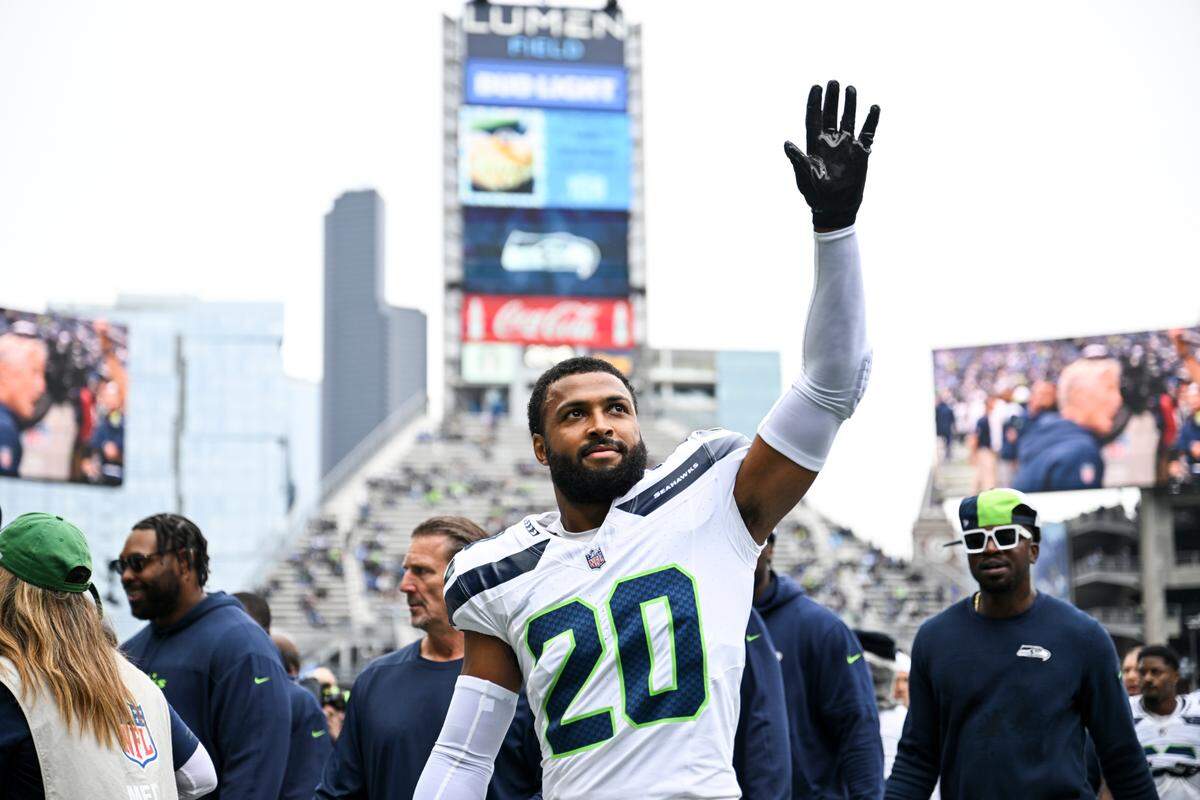 Seattle Seahawks safety Julian Love (20) waves to fans before the game between the Seattle Seahawks and the Carolina Panthers at Lumen Field, Sunday, Sept. 24, 2023, Seattle, Wash.