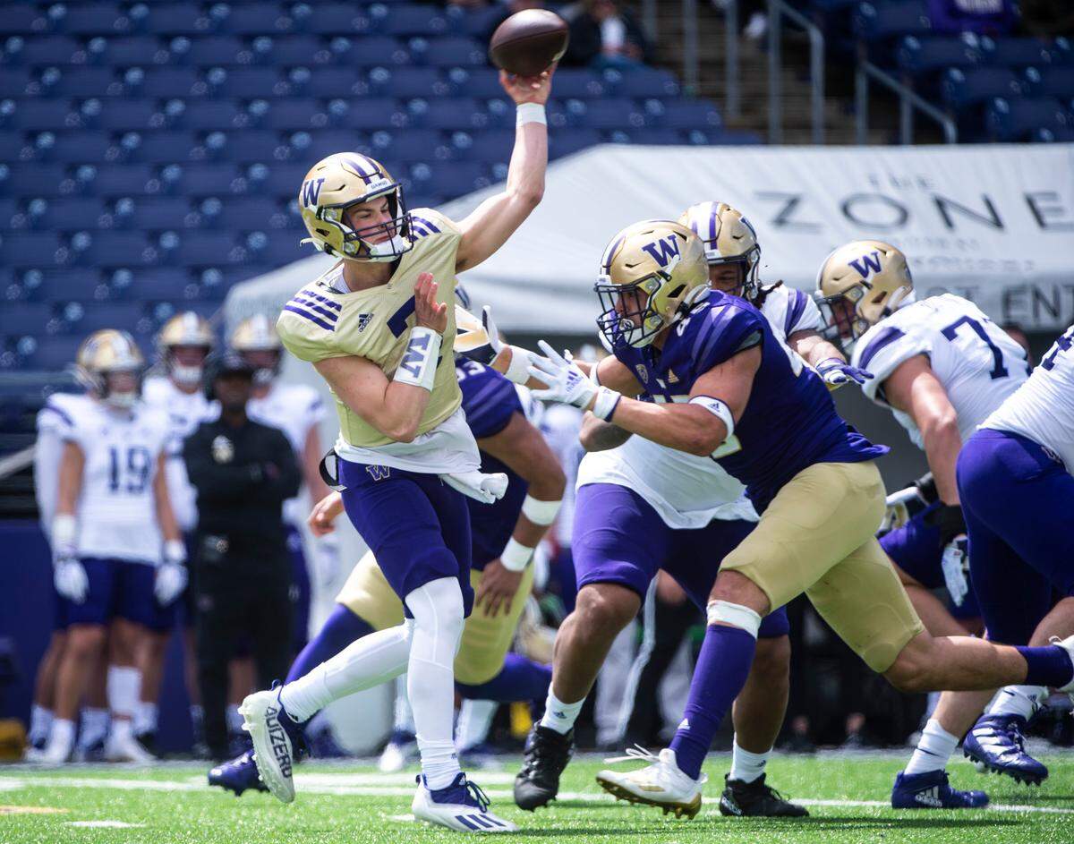 University of Washington Huskies quarterback Sam Huard (7) throws the ball during the spring game at Husky Stadium in Seattle, Wash. on Saturday, April 30, 2022.
