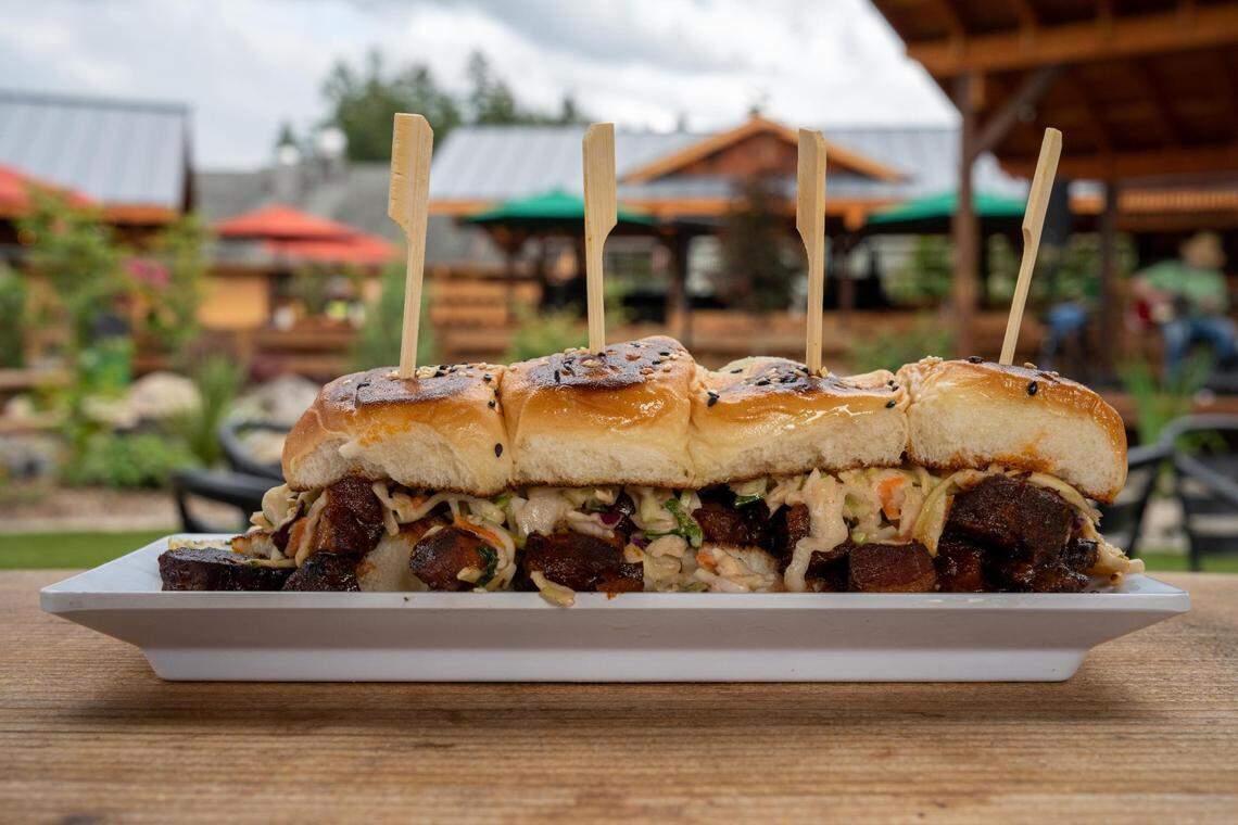 The menu at Mill Haus is built for sharing, with flatbreads, sliders, street tacos and salads. The signature Burnt Ends Sliders feature crisped pork belly with gochujang and house coleslaw.