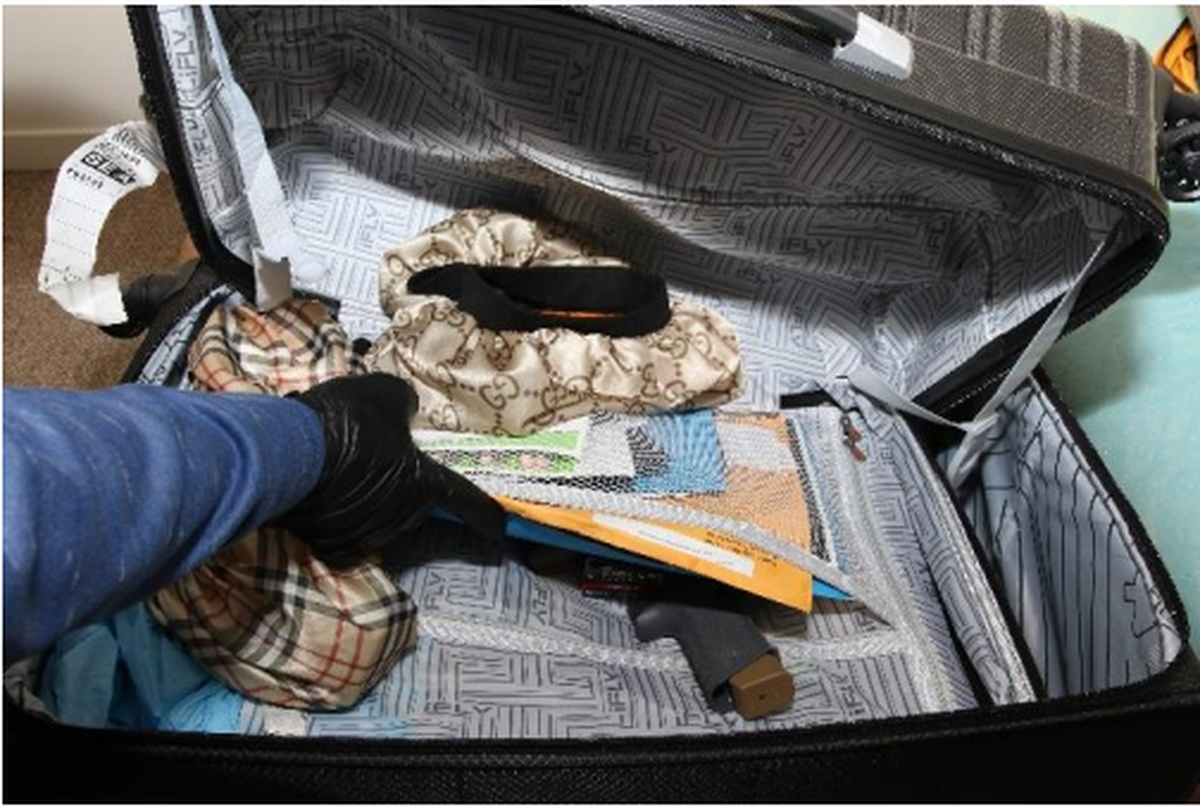 A forensic analyst determined a 9mm pistol found in a suitcase in Maleke Pate’s residence was the gun used in the Oct. 21, 2021 shooting, according to prosecutors, but no DNA from Pate was found on the weapon. Also in the suitcase were documents addressed to Pate.