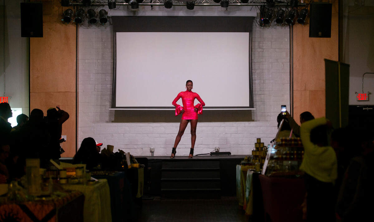 Runway model LaTiva shows off one of Sarah Spice Designs swimsuits during the fashion shown at the Black Night Market in Edison Square in Tacoma, Washington, on Friday, April 29, 2022.