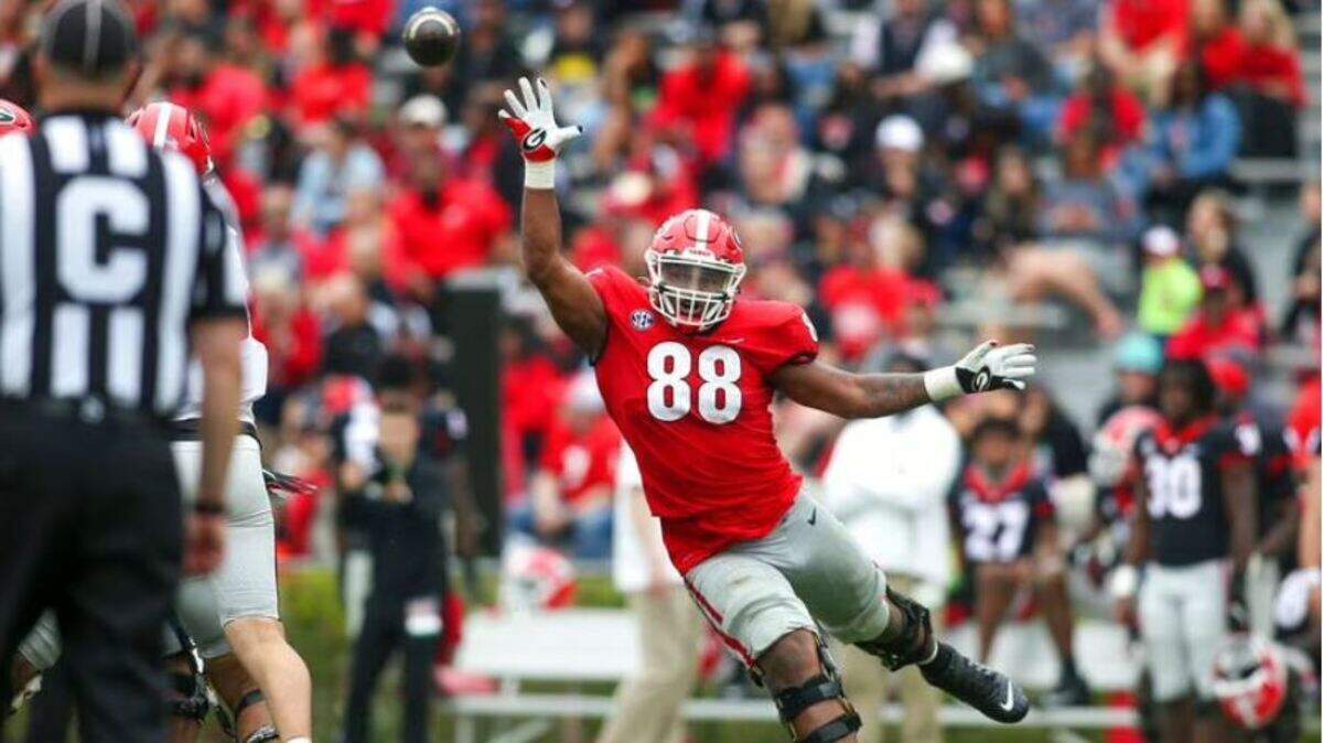 Georgia defensive lineman Jalen Carter reaches for a ball in the second half of Georgia’s spring game, Saturday, April 16, 2022, in Athens. The Seahawks were reportedly hosting Carter for a visit before the 2023 NFL draft.
