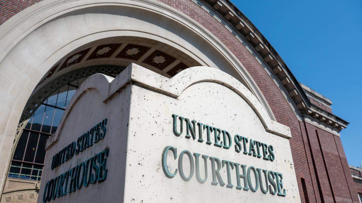 A sign marks the U.S. District Court for the Western District of Washington as a federal courthouse on April 23, 2025, in Tacoma, Wash. U.S. .