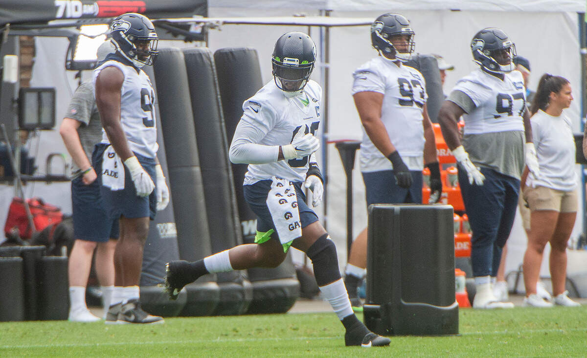 Seahawks defensive end Aldon Smith sprints during a drill on the third day of Seahawks training camp Saturday, July 30, 2021 at the VMAC in Renton.