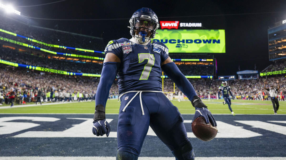 Seattle Seahawks linebacker Uchenna Nwosu (7) celebrates after picking up a fumble by New England Patriots quarterback Drake Maye (10) during the fourth quarter of Super Bowl LX at Levi's Stadium on Feb. 8, 2026 in Santa Clara, Calif.