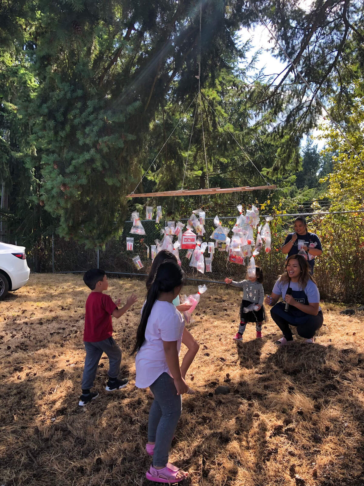 Children playing pabitin at the 2019 Sari-Sari Fiesta.