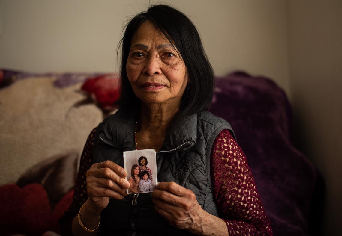 Lorng Raing holds a photograph of her son, Roeuth An, in her home in Tacoma, Wash., on Friday, May 3, 2019. Roeuth An narrowly avoided deportation after he was granted an emergency pardon by Gov. Jay Inslee.