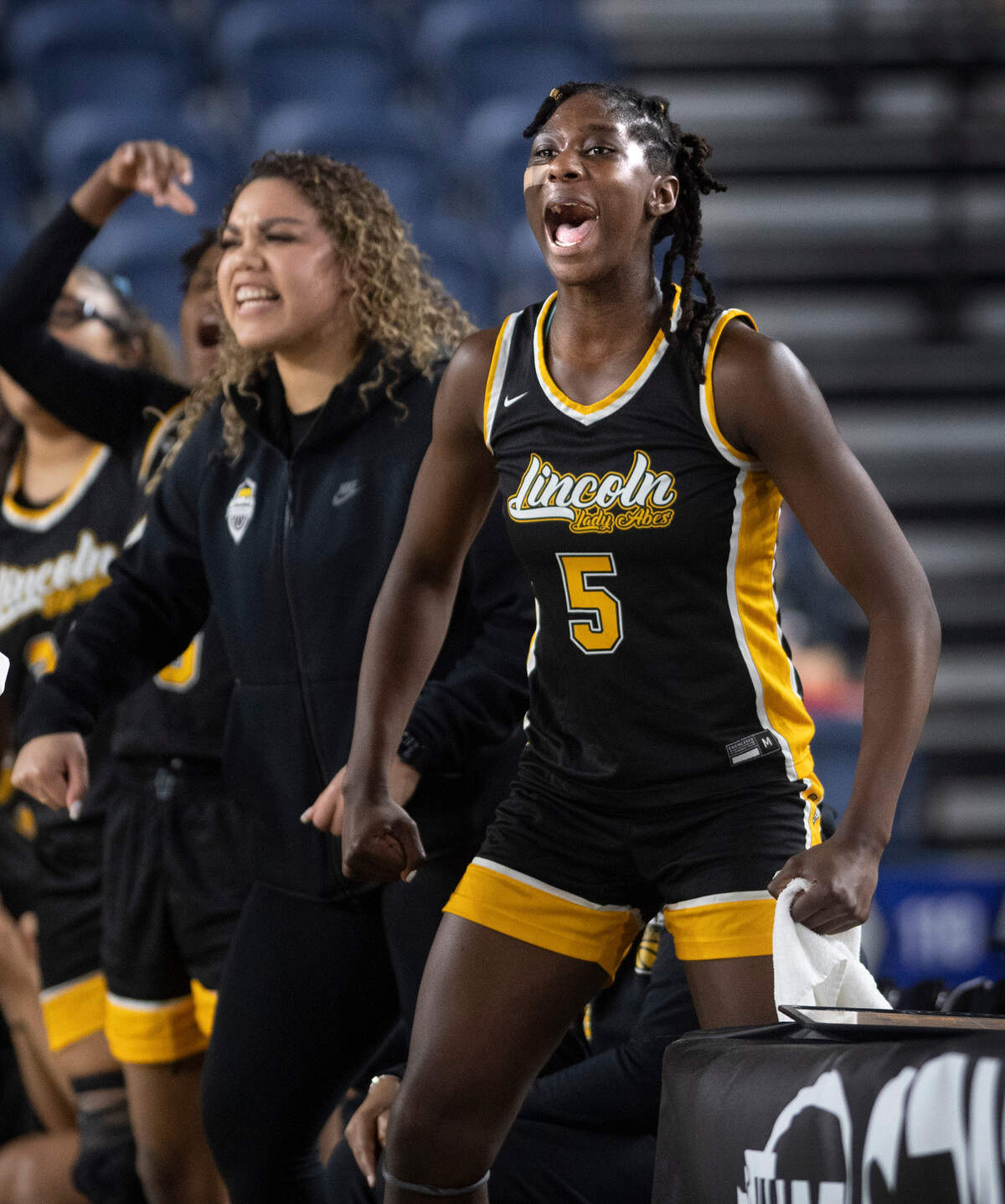 Lincoln’s Oliviyah Edwards celebrates an Abes rally during their state quarterfinal game against the Lake Washington Kangaroos at the WIAA state basketball tournament in the Tacoma Dome in Tacoma, Washington, on Wednesday, March 1, 2023. Lake Washington won the game, 57-52.