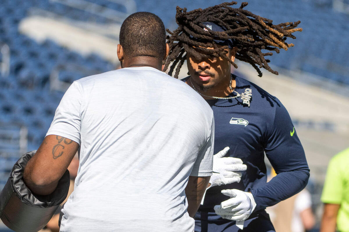 Seattle Seahawks defensive end Darryl Johnson (40) works through drills prior to the start of an NFL game on Sunday, Sept. 25, 2022, at Lumen Field in Seattle.