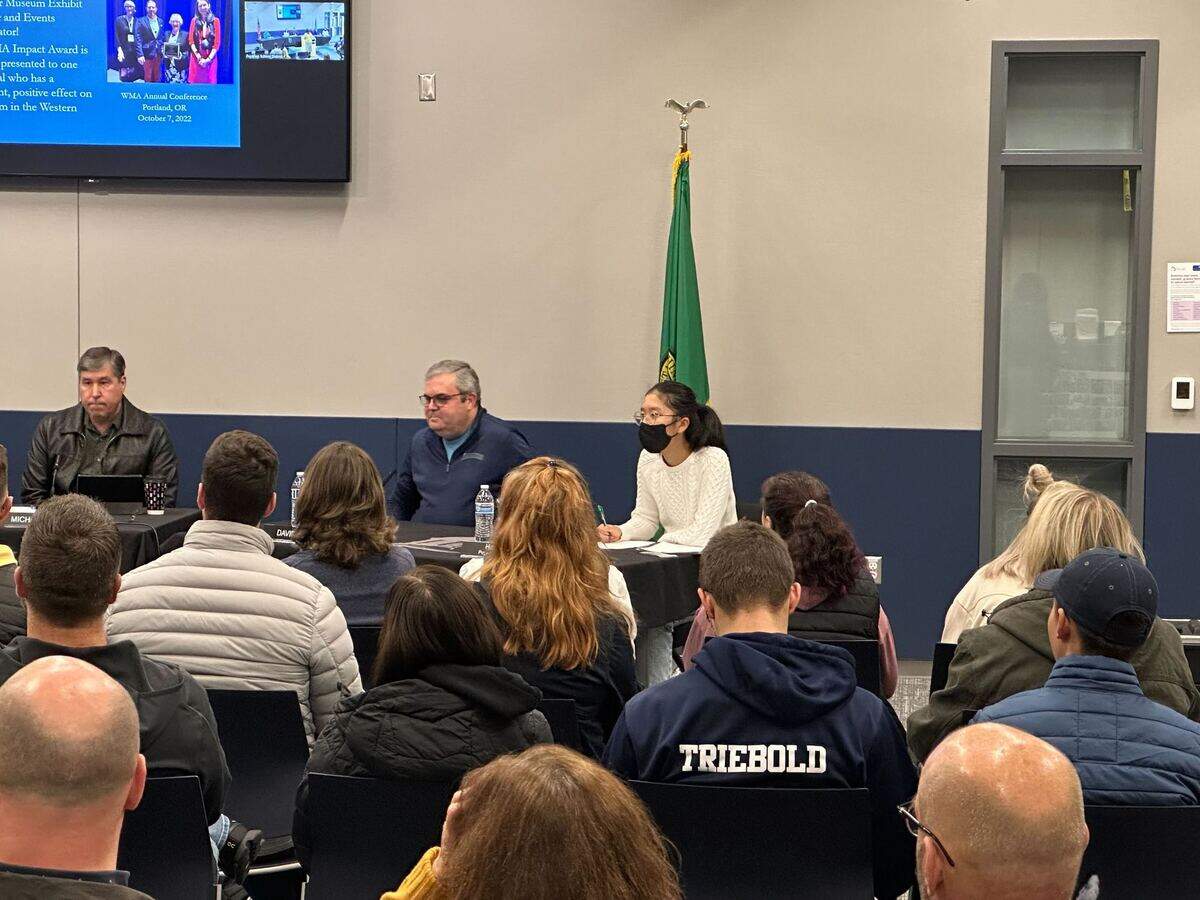 From left to right: Puyallup School Board members Michael Keaton, David Berg and Puyallup High School junior Hailey Kim. Kim is one of the eight school board student representatives for the Puyallup School District.