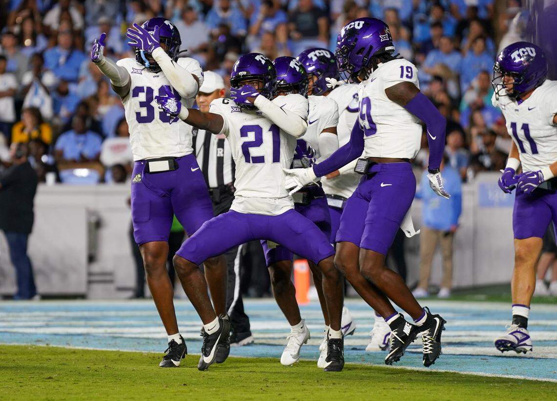 CHAPEL HILL, NORTH CAROLINA - SEPTEMBER 01: Safety Bud Clark #21 and members of the Texas Christian University Horned Frogs celebrate after Clarks interception returned for a touchdown at the end of the first half against the University of North Carolina Tar Heels at Kenan Stadium on September 01, 2025 in Chapel Hill, North Carolina. (Photo by Alex Halloway/Getty Images)