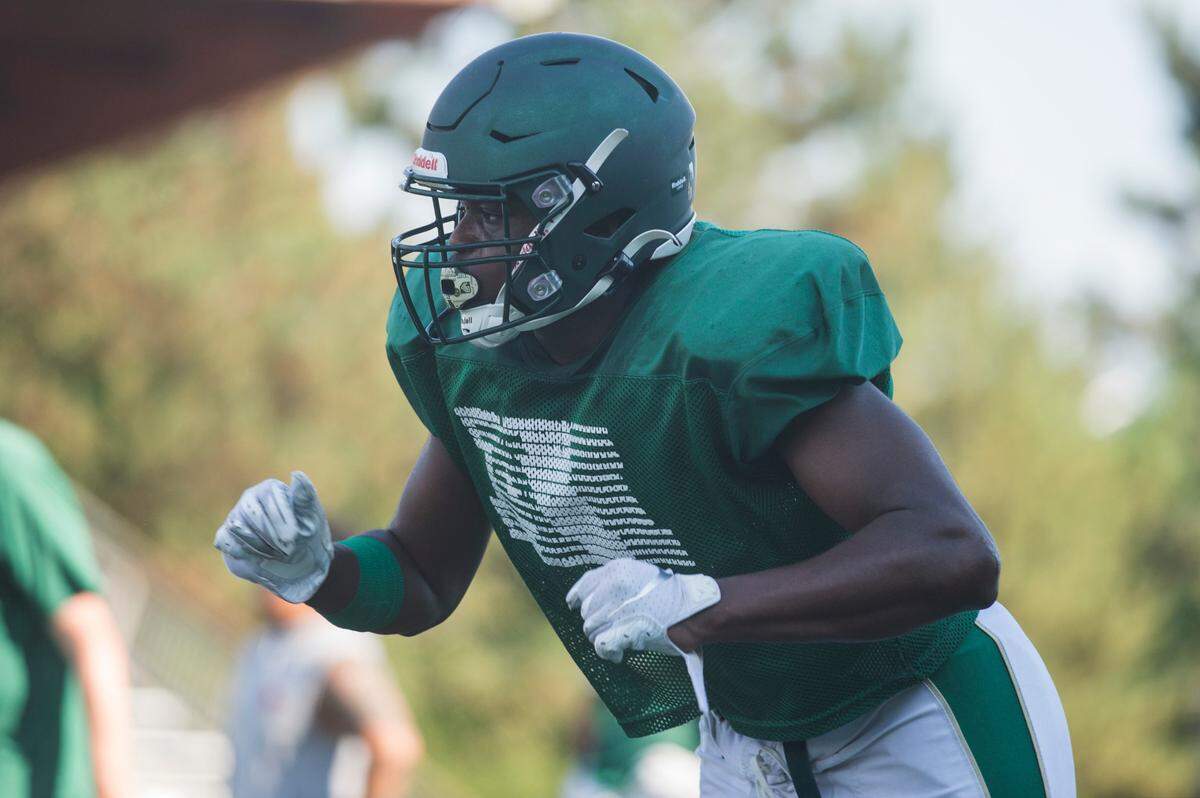 Auburn High School wide receiver Luvens Valcin runs during a scrimmage period at practice on Tuesday, Aug. 23, 2022 in Auburn, Wash.