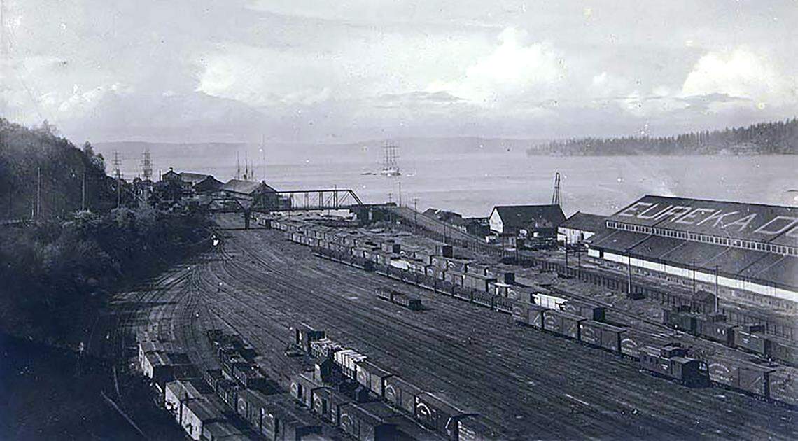 Looking northwest from the Northern Pacific Railroad freight yards and warehouses at north end of Pacific Ave., Shows the Eureka Dock and warehouse c. 1900. University of Washington, Wilhelm Hester Photographs Collection