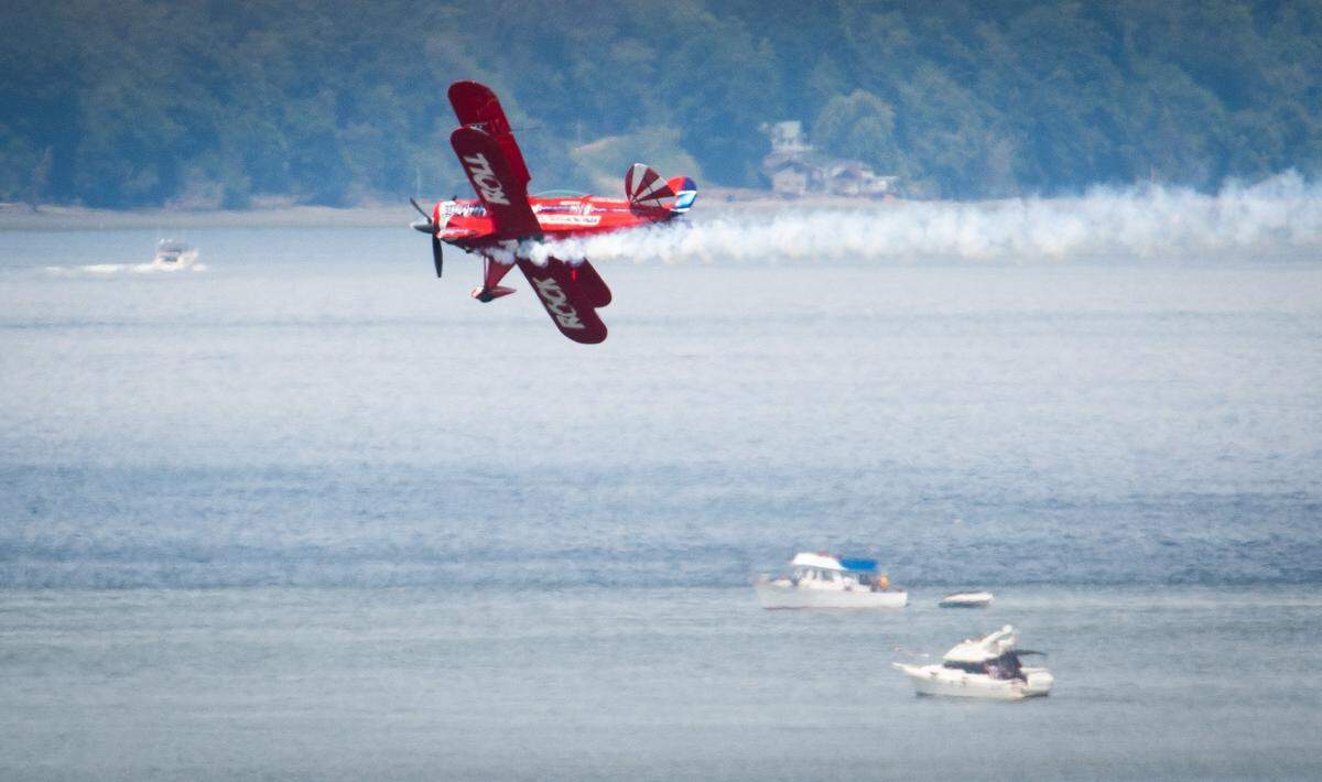 Will Allen performs with his biplane during the 2019 Tacoma Freedom Fair and Air Show along Ruston Way in Tacoma on Thursday, July 4, 2019.