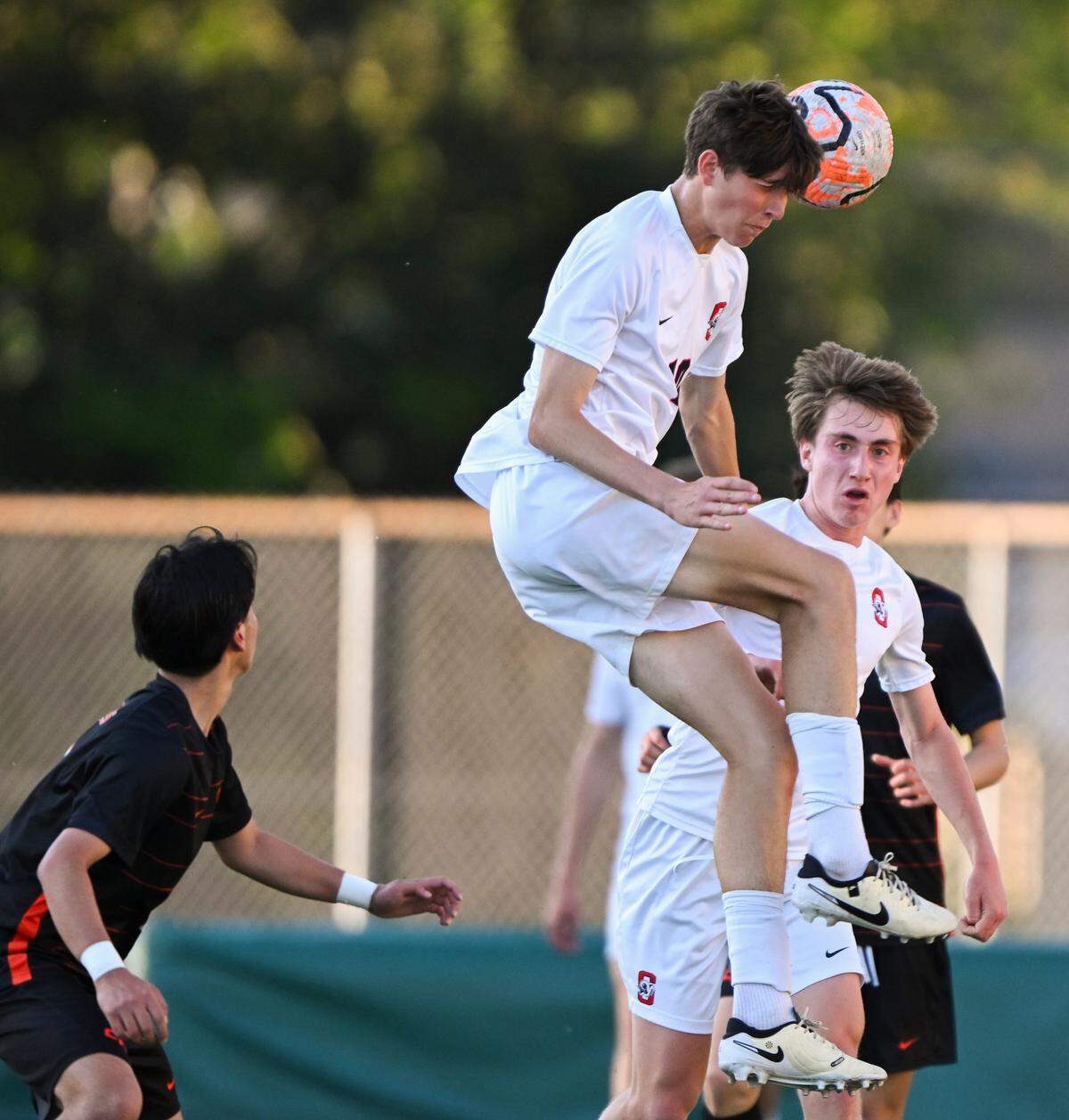 Silas’ Caden Grant (10) heads the ball during the 3A District Boys Soccer Championship match against Central Kitsap at Auburn Memorial Stadium, on Thursday, May 9, 2024, in Auburn, Wash.