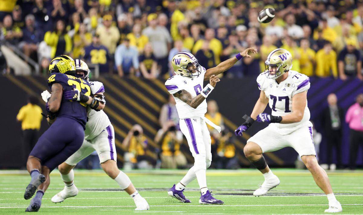 Washington Huskies quarterback Michael Penix Jr. (9) throws the ball during the third quarter of the College Football Playoff National Championship game against the Michigan Wolverines at NRG Stadium on Monday, Jan. 8, 2024, in Houston.