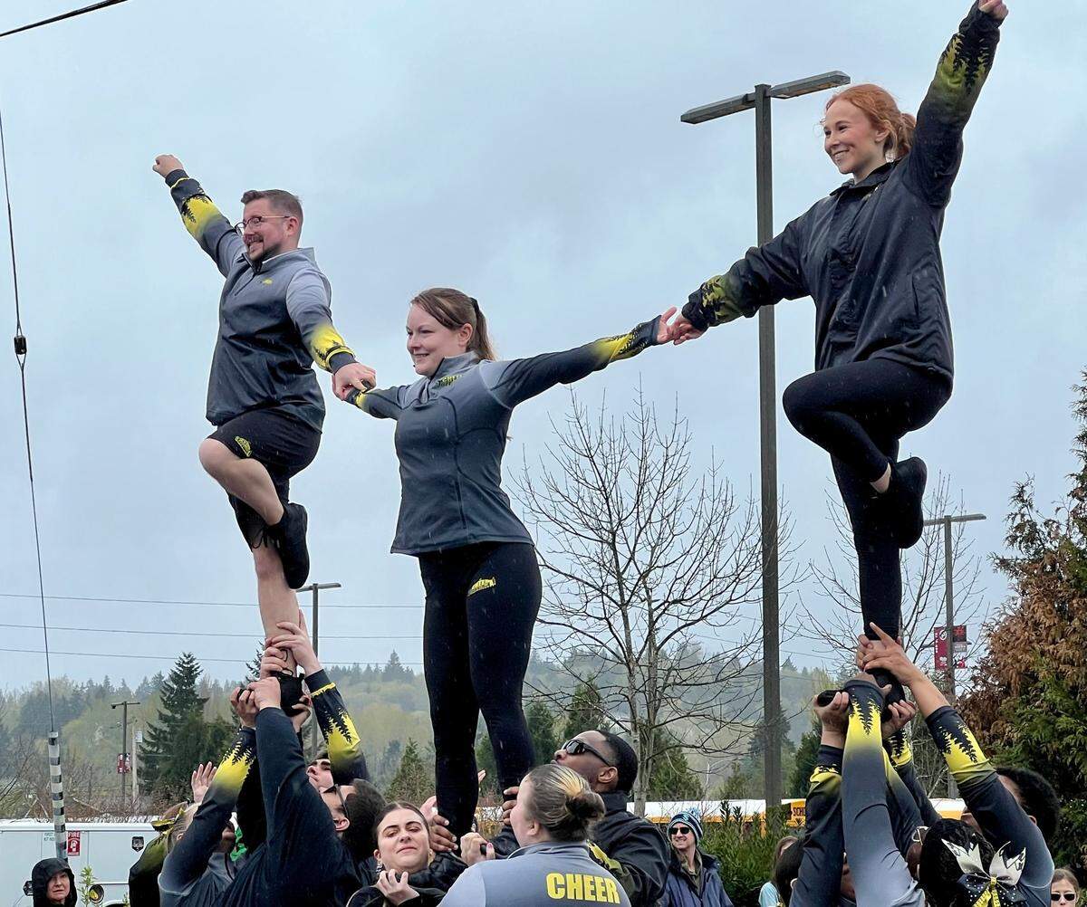 Cheerleaders performed stunts at the 2024 Daffodil Festival parade in Puyallup on Saturday, April 6.