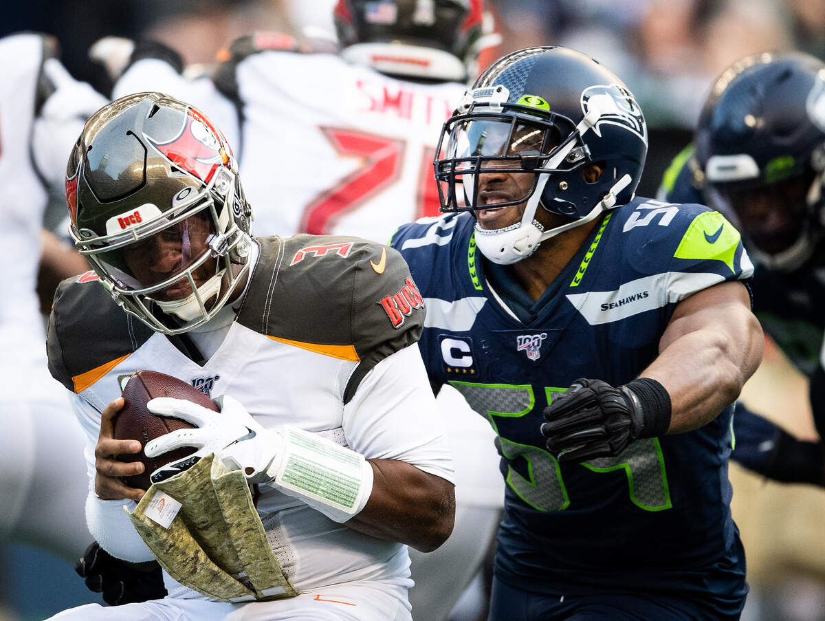 Seattle Seahawks middle linebacker Bobby Wagner (54) sacks Tampa Bay Buccaneers quarterback Jameis Winston (3) during the fourth quarter. The Seattle Seahawks played the Tampa Bay Buccaneers in a NFL football game at CenturyLink Field in Seattle, Wash., on Sunday, Nov. 3, 2019.
