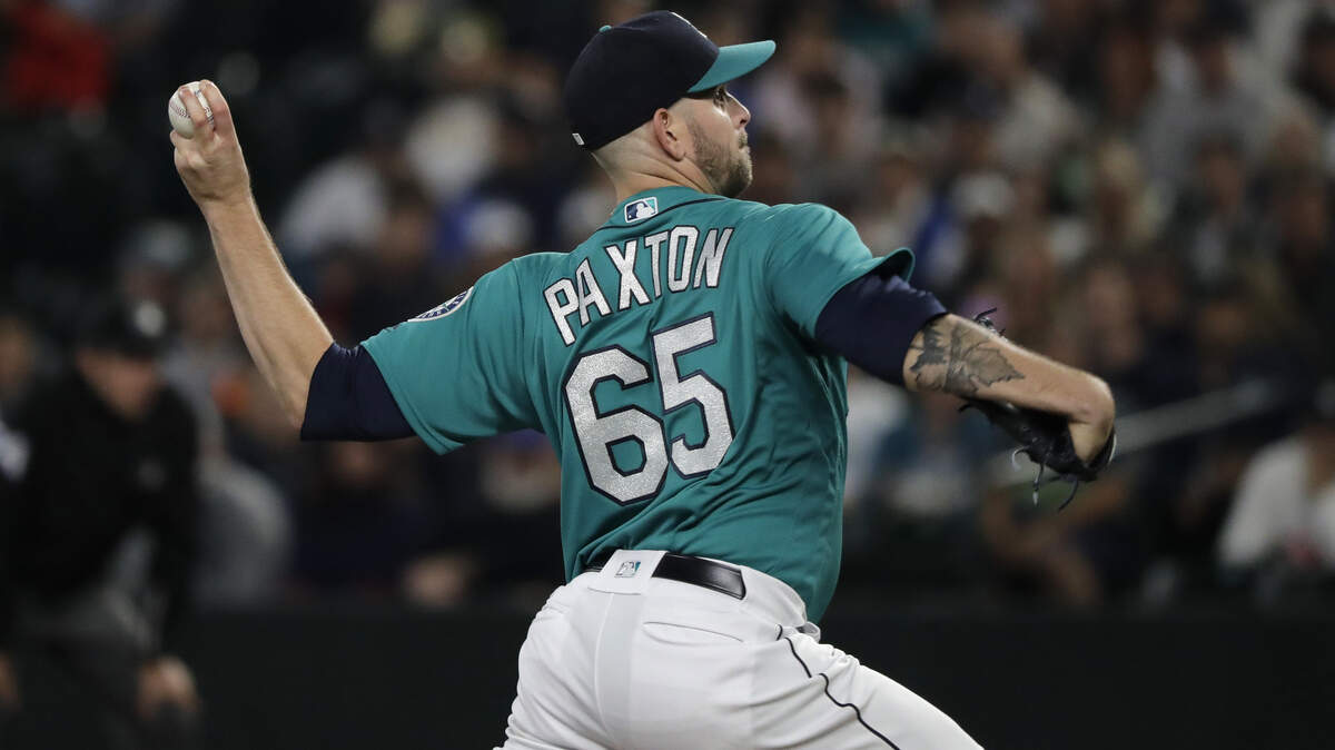 Seattle Mariners starting pitcher James Paxton throws to a New York Yankees batter during the first inning of a baseball game Friday, Sept. 7, 2018, in Seattle. (AP Photo/Ted S. Warren)