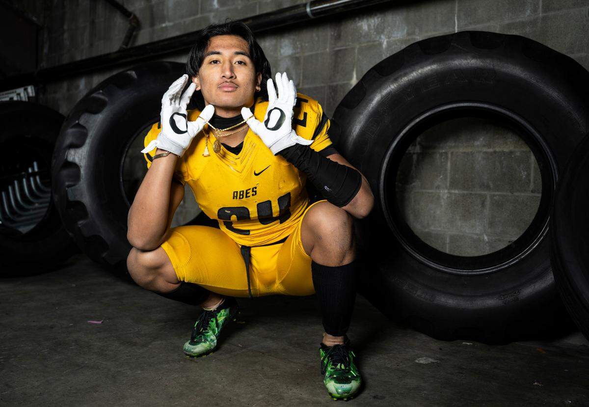 Lincoln senior ZyZy Sayavong poses for a portrait after being selected as a linebacker for The News Tribune’s 2022 All-Area football team, at Mount Tahoma High School in Tacoma, Wash. on Dec. 4, 2022.