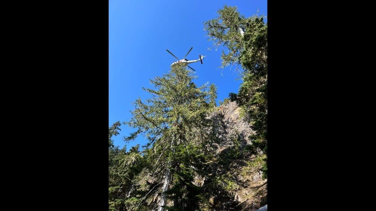A hunter was trapped on a cliffside near Mount Constance in the Olympic National Forest in Washington, rescuers said. He was saved on Sept. 18.