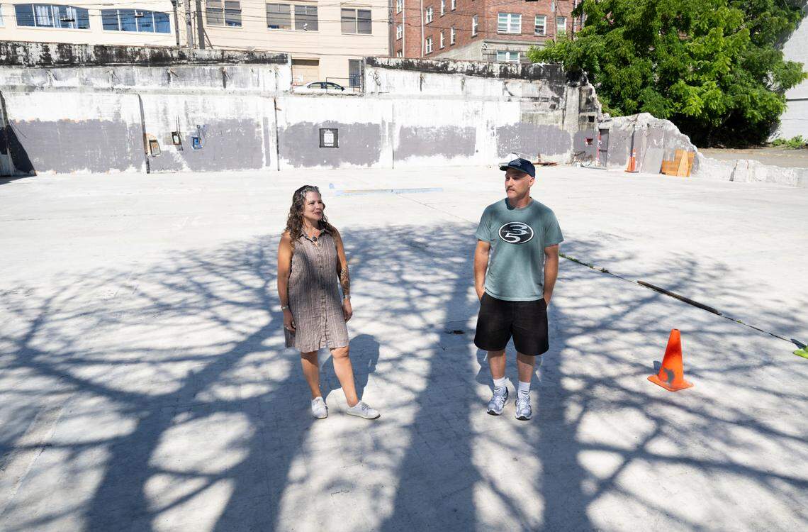 Heather Moss, roller skater and community member, and Alex Boone, local skater, pose for a photo in the now-vacant DIY Skatepark on Fawcett Ave on Tuesday, July 1, 2025, in Tacoma, Wash.