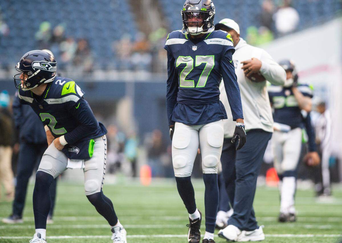 Seattle Seahawks cornerback Tariq Woolen (27) warms up before the start of an NFL game against the California Panthers at Lumen Field in Seattle Wash., on Dec. 11, 2022.