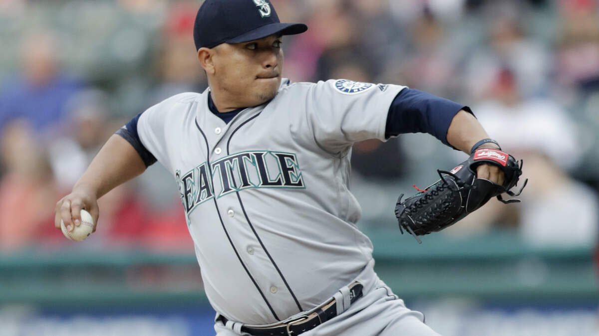 Seattle Mariners starting pitcher Erasmo Ramirez delivers in the first inning of a baseball game against the Cleveland Indians, Friday, April 27, 2018, in Cleveland. (AP Photo/Tony Dejak)