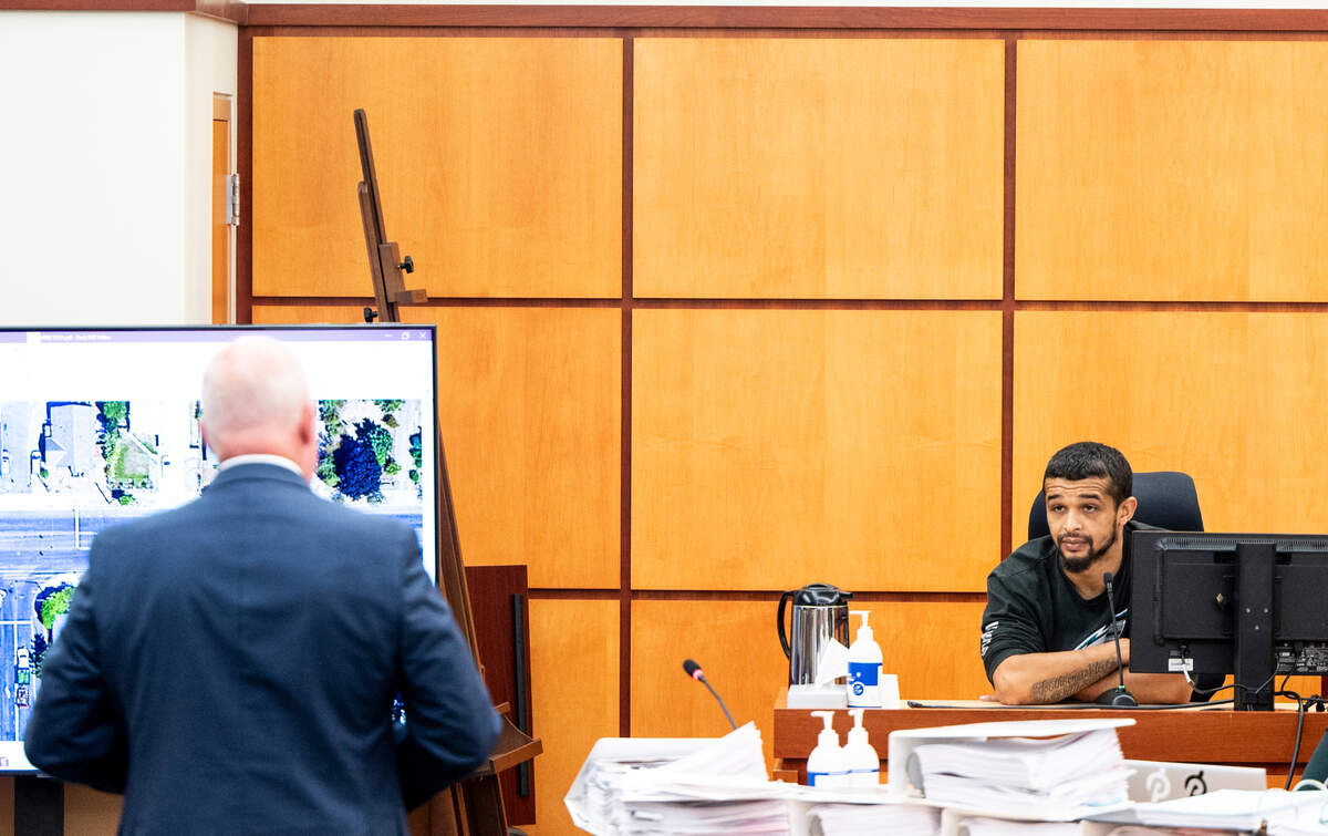 Defense attorney Brett Purtzer cross-examines Keyon Lowery during the trial of Tacoma police officers Christopher Burbank, Matthew Collins and Timothy Rankine in the killing of Manny Ellis.