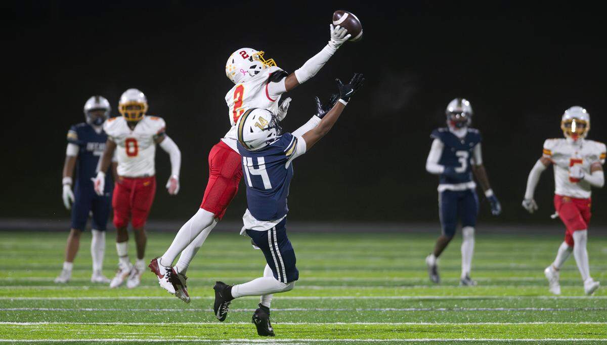 Mount Tahoma cornerback Angel Urban makes a game-saving tip of a pass intended for Decatur wide receiver Scottie Dinwittie late Friday night’s state football playoff game at Federal Way Memorial Stadium in Federal Way, Washington, on Nov. 15, 2024. Mount Tahoma won the game, 23-21.