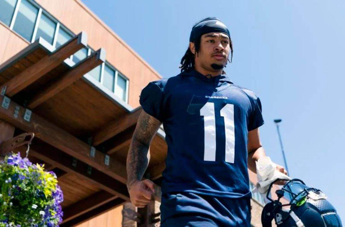 Seahawks rookie wide receiver and first-round draft choice Jaxon Smith-Njigba walks out the Virginia Mason Athletic Center for a practice during Seahawks minicamp in Renton June 6, 2023.