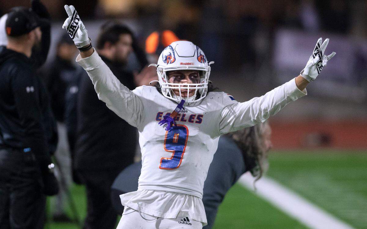 Graham-Kapowsin linebacker Noah Flores celebrates a stop of the Sumner Spartans during Friday night’s 4A football state quarterfinal game at Sunset Chev Stadium in Sumner, Washington, Nov. 18, 2022. Graham-Kapowsin won the game, 28-21.