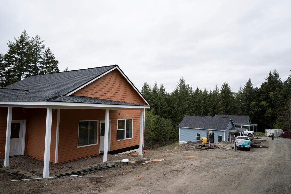Habitat for Humanity works on three homes, only one of which has a family waiting to live in it, on Monday, April 8, 2024, in Gig Harbor, Wash.